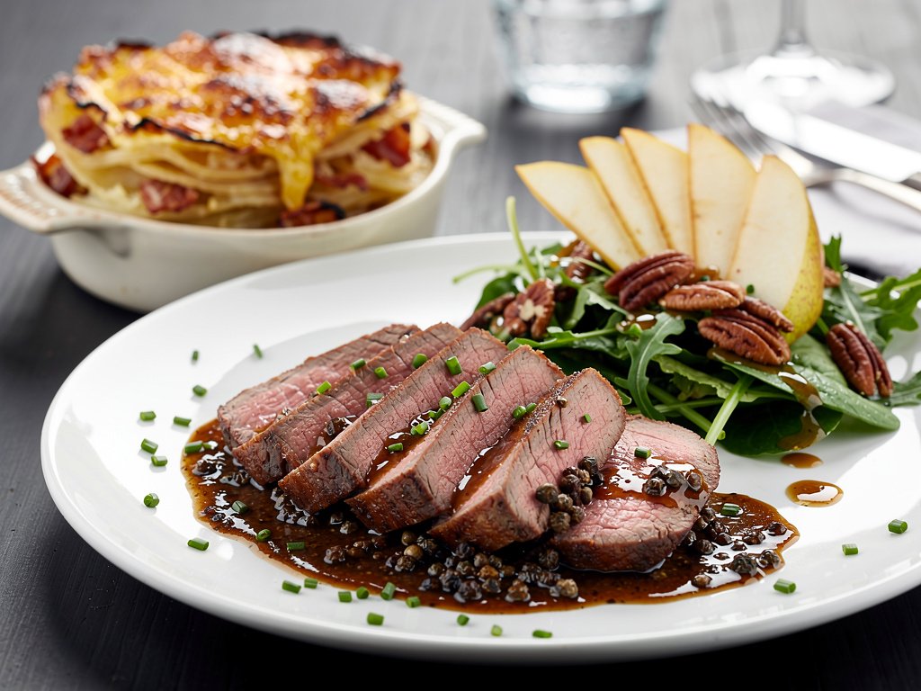 Beef Tenderloin with Peppercorn Sauce and Cheesy Potato Gratin