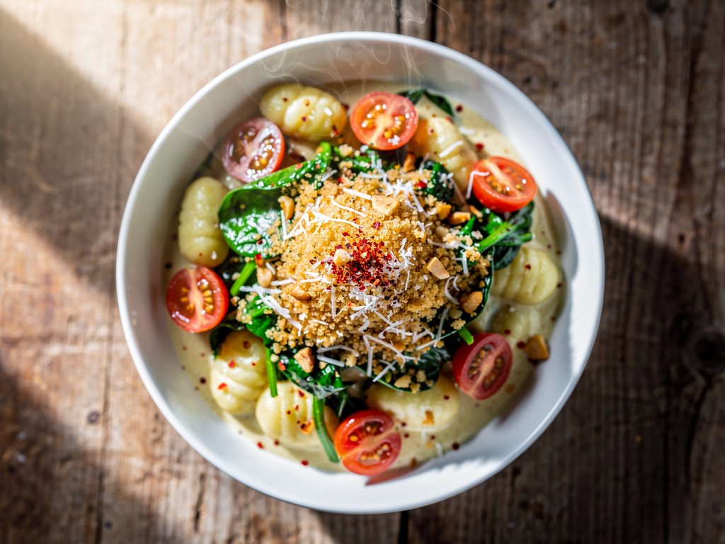 Creamy Gnocchi with Spinach and Tomatoes in Garlic Panko Crumb